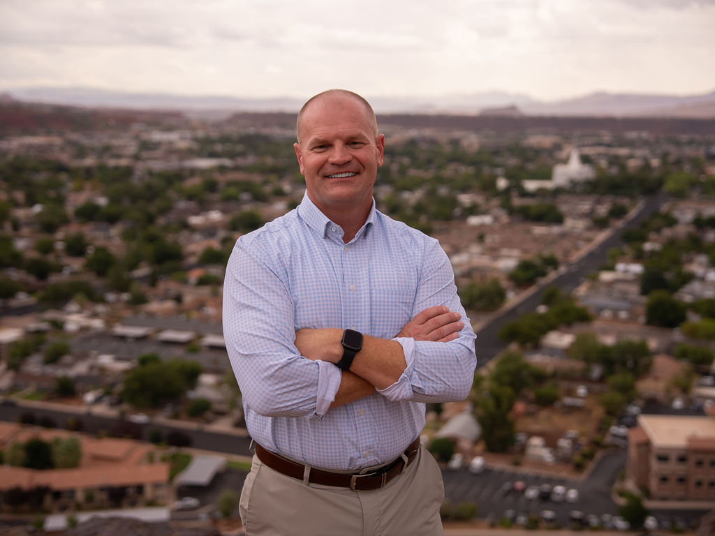 Brandon Olson walking in the southern Utah landscape