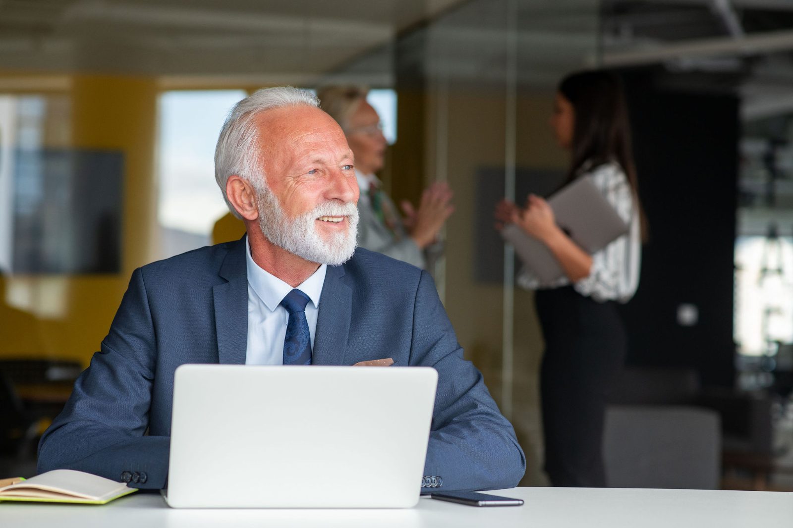 A client reviewing tax documents at a conference table